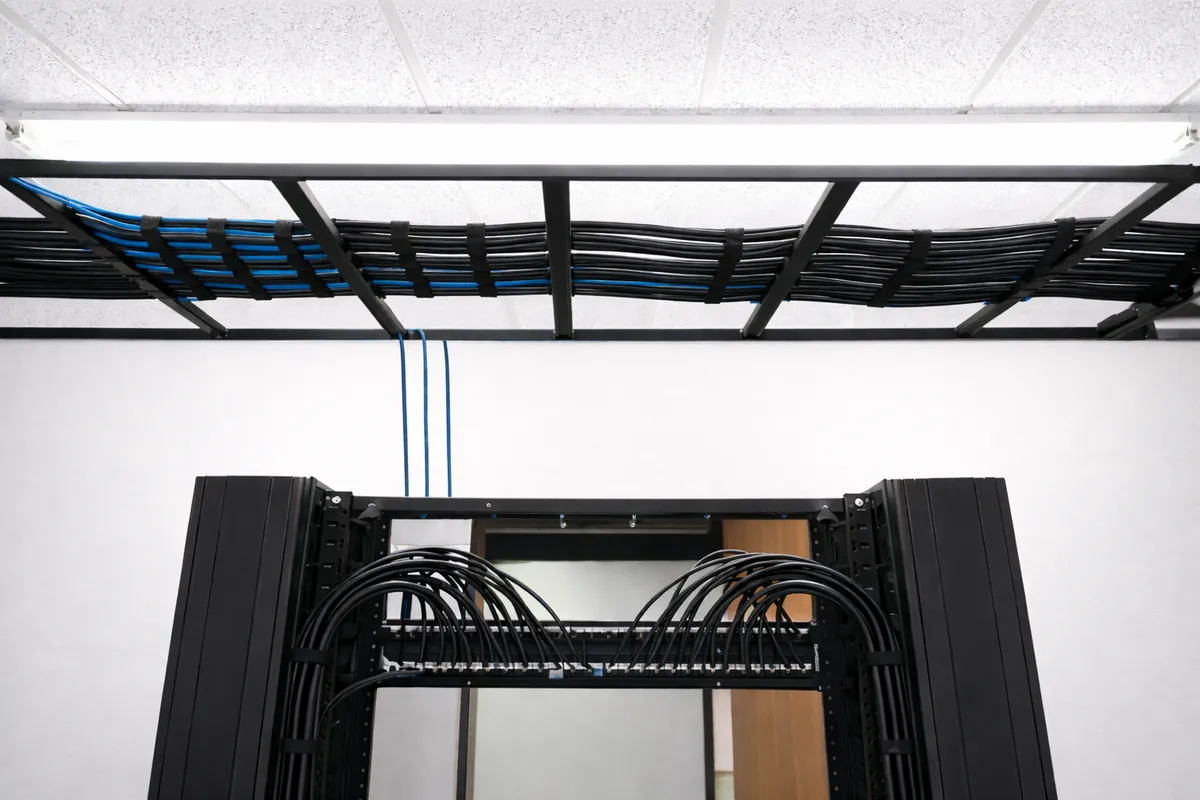 Technician installing security camera system